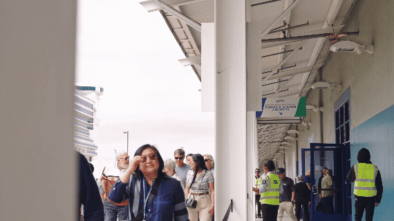 .gif of San Diego Bay visitors walking along the entrance of the Port of San Diego's B-Street Pier
